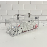 3 part candy box saying LIFE IS SWEET with double letters on a kitchen counter with candy.