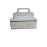 Caddy with handle says Let's Get Toasted and has compartments for all Smore's essentials.