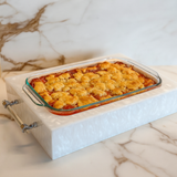 baked dessert in pyrex with custom acrylic base for stylish holiday dessert presentation