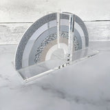 Rainbow bookend set featured on a marble table.