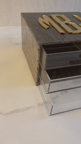 video of personalized jewelry box in silver marble and MBJ in gold mirror lettering