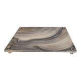 raised serving platter in aztec print with black, white, gold, bronze colors, great on a kitchen island or t=serving tray.