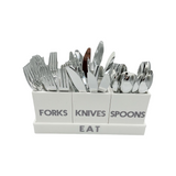 white solid utensil caddyutensil holder with forks, knives and spoons displayed in the caddy