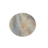 lazy susan with grey/blue, gold and tan tones.