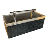 black marble storage box with acrylic handle and silver detail.