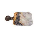 charcuterie paddle board with gold black & white print.