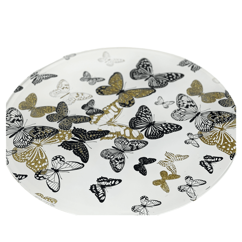 lazy susan showing the gold, black and white butterfly print. 