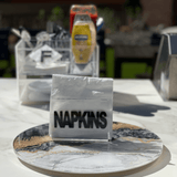 LAZY SUSAN | SUNRISE MARBLE displayed with a napkin holder showing one way how to use it- A Gifted Story