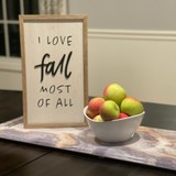 long charcuterie cheeseboard in grey gold marble as centerpiece on table for dinner
