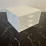 JEWELRY BOXES in white marble on a black & white dressser