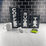 personalized kitchen canister set black marble on a kitchen counter