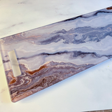 close up pic of grey marble 12x36 entertainment piece