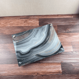 raised cheeseboard on a wooden table ready to serve your guests.