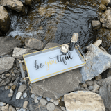 acrylic be you tiful luxe tray outside next to a creek and rocks