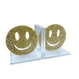 clear acrylic stand, gold glitter smiley face and cut out of eyes and smiley face