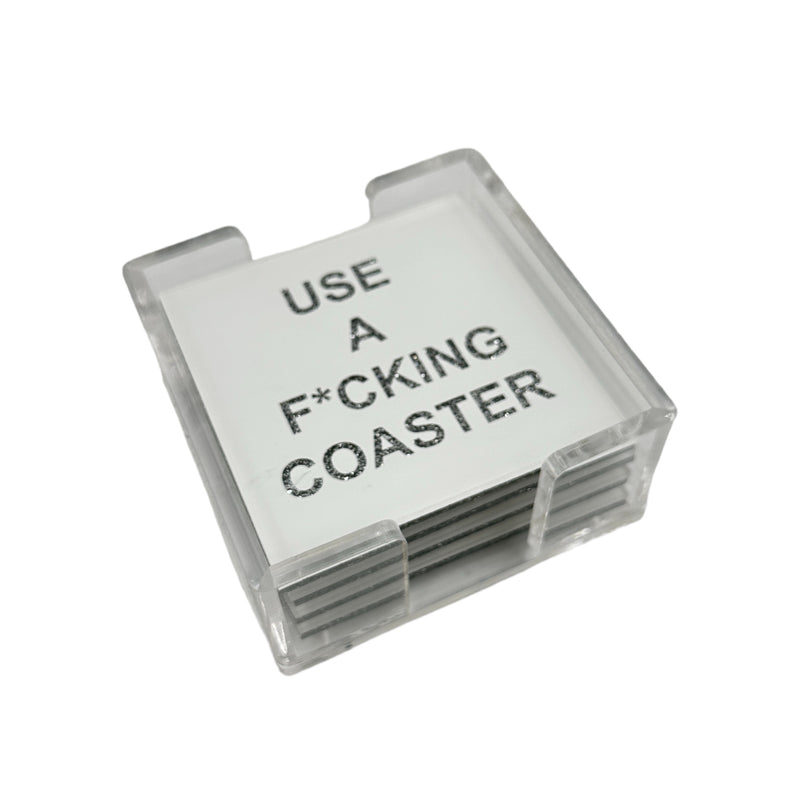Coaster set that says USE A F*CKING COASTER in sparkle letters and a clear acrylic holder