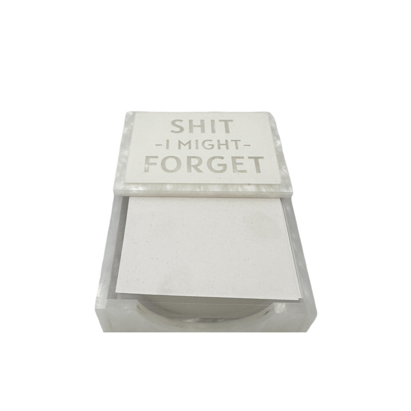 notepad with the words SH*T I MIGHT FORGET and holder are white marble acrylic, imprinted on a white acrylic plate.