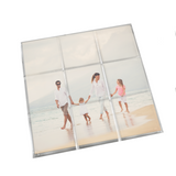 a tic tac toe board featuring a family photo of a family walking on the beach, game pieces can be customized to match the image and person