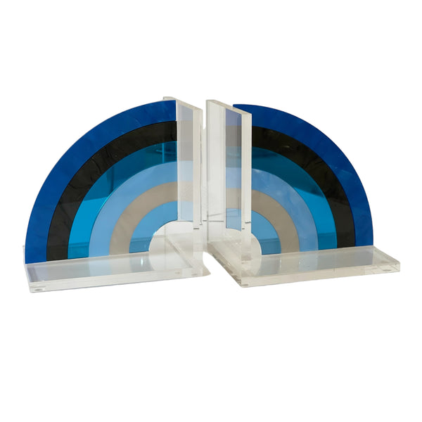 acrylic rainbow bookends in dark blue marble, solid dark blue, solid blue, light blue marble, clear mirror and light  blue mirror 