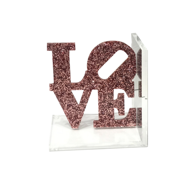 pink sparkle acrylic bookends that spell LOVE