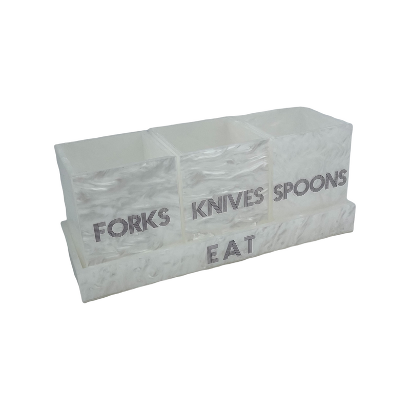 white marble utensil caddy on tray that says EAT with 3 cups saying FORKS, KNIVES and SPOONS , dark grey etched lettering