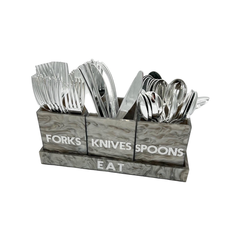 silver marble utensil holder with forks, knives and spoons displayed in the caddy