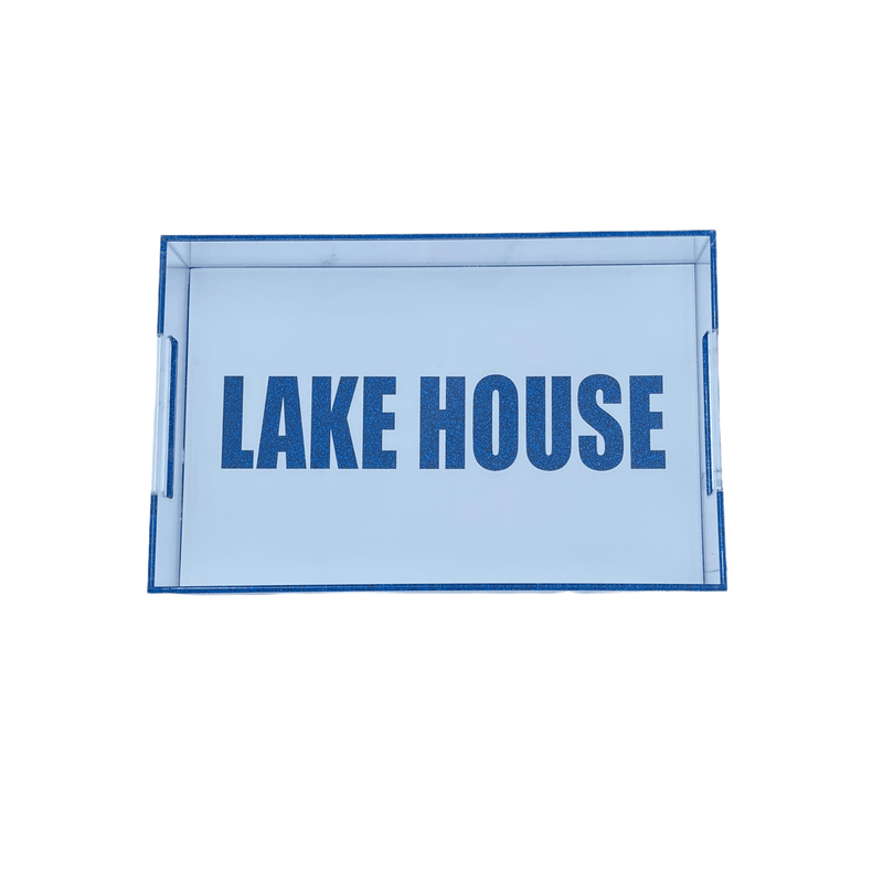 clear and white tray that says  LAKE HOUSE  in dark blue sparkle 