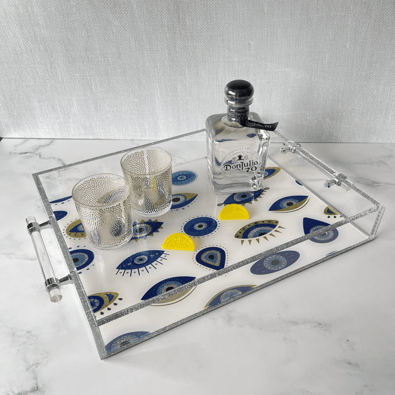 ultra luxe evil eye tray featured with barware.