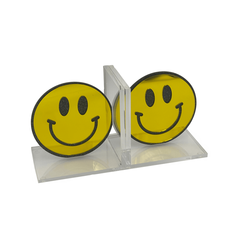 vibrant smiley face in gold mirror and black glitter eyes, smile and outline of face