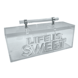 close up image of life is sweet box, clear acrylic handle with silver detail 